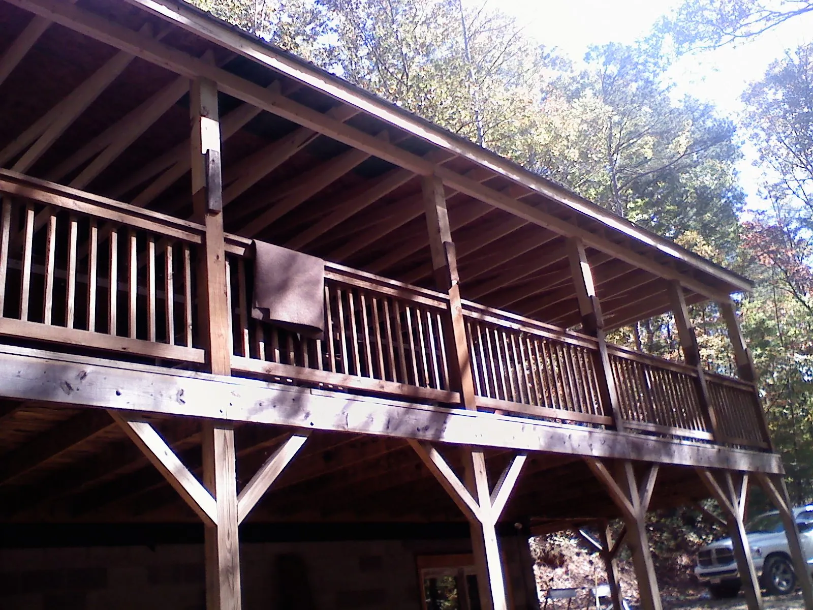 Timber framing under a new elevated porch and deck — Roof Leak Repair in Fidelity by Roofing Brothers